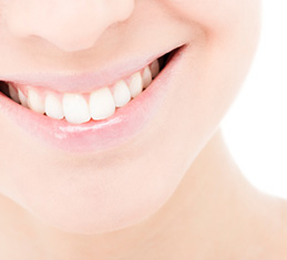 Denver patient has white teeth after receiving cosmetic dentistry treatment near Highlands Ranch.