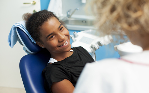 Patient at her emergency dentistry appointment near Highlands Ranch.