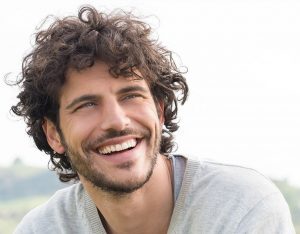 Smiling young man in Denver had successful wisdom teeth extraction