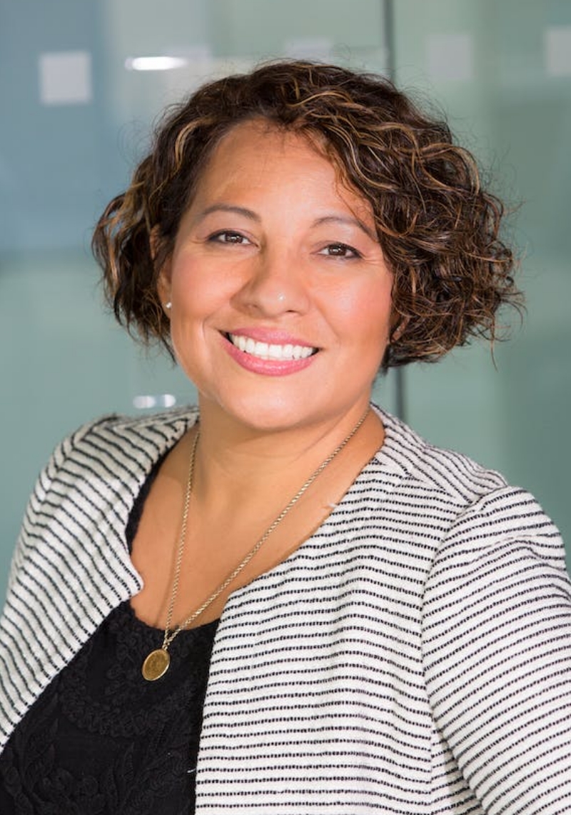 Smiling dental bridge patient in Denver