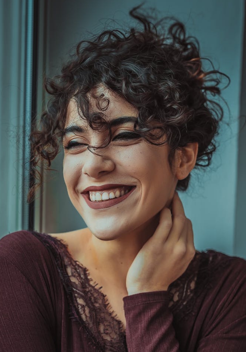 Smiling dental implants patient in Denver