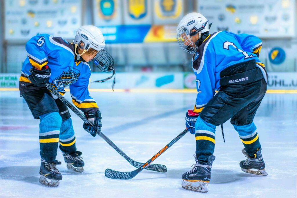 Hockey players wearing sports mouth guards in Denver