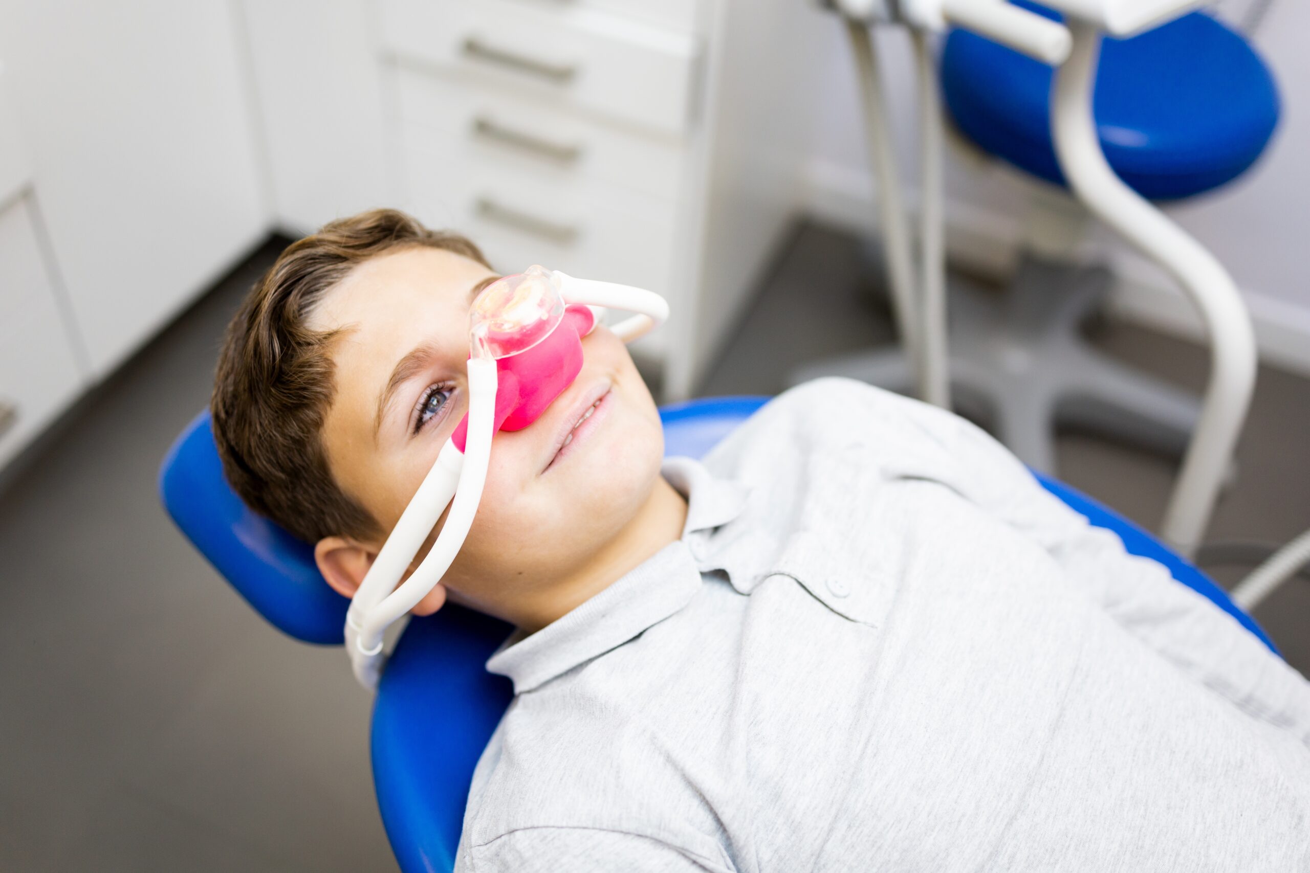 young boy undergoing light sedation for a common dental procedure