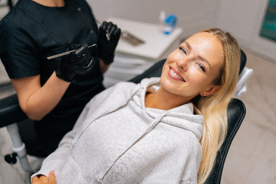 young woman relaxed in a dental chair