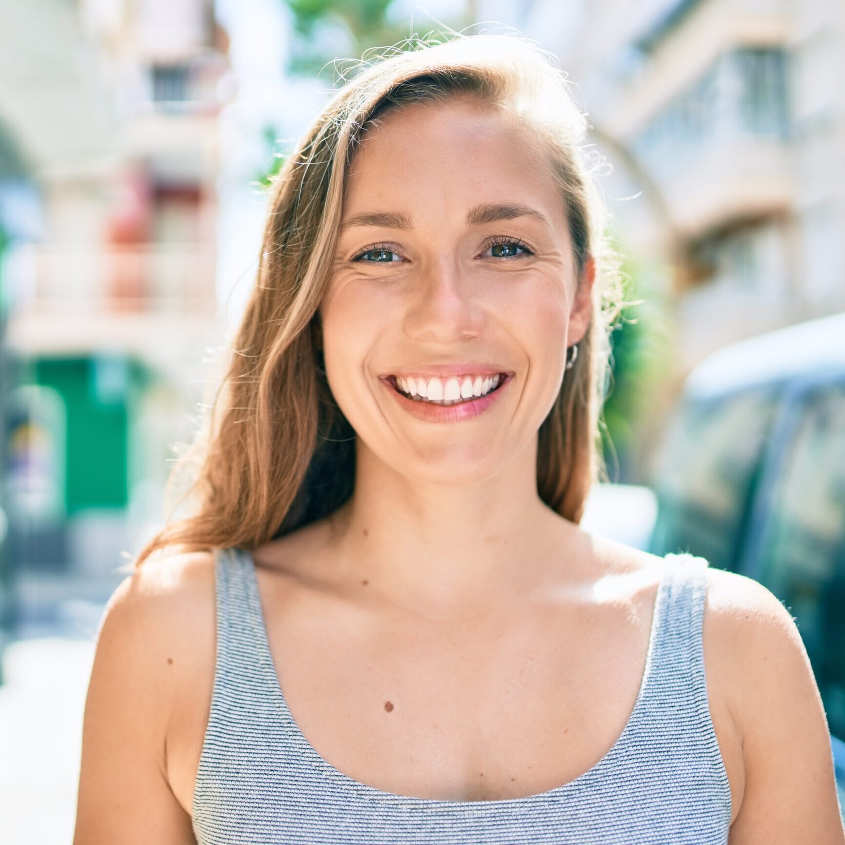 highlands ranch woman showing off perfect smile from cosmetic dentist in lone tree